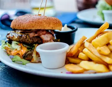 Burger and fries on a plate